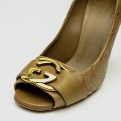 Pre Owned Gucci GG Logo Stamped Guccissima Caramel Leather Open Toe Pumps Size 38.5