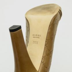 Pre Owned Gucci GG Logo Stamped Guccissima Caramel Leather Open Toe Pumps Size 38.5
