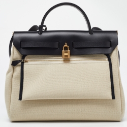 مملوكة مسبقًا Hermès Beige/Black Canvas and Vache Hunter Leather Herbag Zip 31 Bag