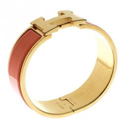 Pre Owned Hermes Clic Clac H Orange Enamel Gold Plated Wide Bracelet PM