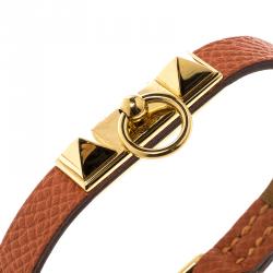 Pre Owned Hermes Micro Rivale Orange Leather Gold Plated Bracelet