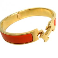 Pre Owned Hermes Clic Clac H Orange Enameled Gold-Plated Bracelet PM