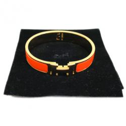 Pre Owned Hermes Clic Clac H Orange Enameled Gold-Plated Bracelet PM