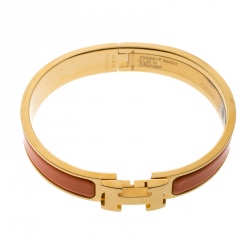Pre Owned Hermes Clic Clac H Orange Enamel Gold Plated Narrow Bracelet GM