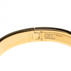 Pre Owned Hermes Clic Clac H Orange Enamel Gold Plated Narrow Bracelet GM