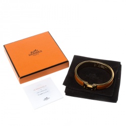 Pre Owned Hermes Clic Clac H Orange Enamel Gold Plated Narrow Bracelet GM
