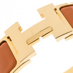 Pre Owned Hermes Clic Clac H Gold Plated Orange Enamel Bracelet