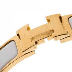 Pre Owned Hermes Clic Clac H White Enamel Gold Plated Narrow Bracelet PM
