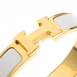 Pre Owned Hermes Clic Clac H White Enamel Gold Tone Narrow Bracelet PM