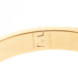 Pre Owned Hermes Clic Clac H White Enamel Gold Plated Narrow Bracelet PM