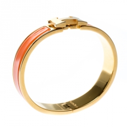 Pre Owned Hermes Clic Clac H Orange Enamel Gold Plated Narrow Bracelet PM