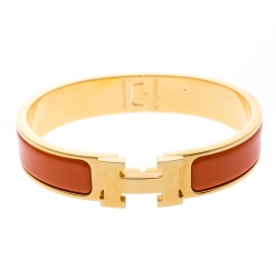 Pre Owned Hermes Clic Clac H Orange Enamel Gold Plated Narrow Bracelet PM