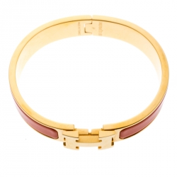 Pre Owned Hermes Clic Clac H Orange Enamel Gold Plated Narrow Bracelet PM