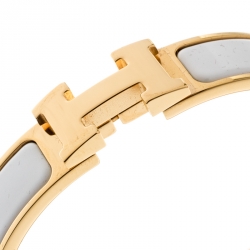 Pre Owned Hermes Clic Clac H White Enamel Gold Plated Narrow Bracelet PM