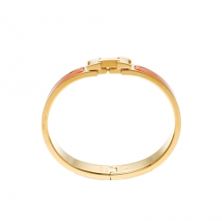 Pre Owned Hermes Clic Clac H Orange Enamel Gold Plated Narrow Bracelet PM
