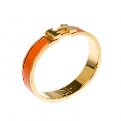Pre Owned Hermes Clic Clac H Orange Enamel Gold Plated Narrow Bracelet PM
