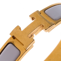 Pre Owned Hermes Clic Clac H White Enamel Gold Plated Narrow Bracelet PM