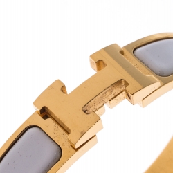 Pre Owned Hermes Clic Clac H White Enamel Gold Plated Narrow Bracelet PM