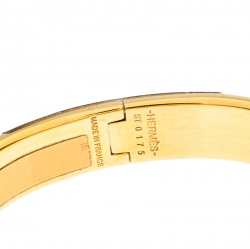 Pre Owned Hermes Clic Clac H Orange Enamel Gold Plated Narrow Bracelet PM