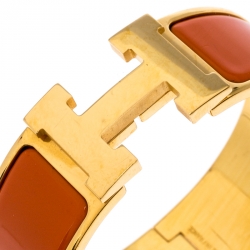 Pre Owned Hermes Clic Clac H Orange Enamel Gold Plated Wide Bracelet PM