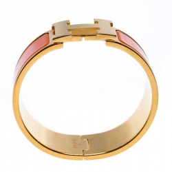 Pre Owned Hermes Clic Clac H Orange Enamel Gold Plated Wide Bracelet PM