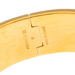 Pre Owned Hermes Clic Clac H Orange Enamel Gold Plated Wide Bracelet PM