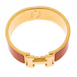 Pre Owned Hermes Clic Clac H Orange Enamel Gold Plated Wide Bracelet PM