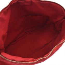 Pre Owned Hermes Red Canvas Trousse De Voyage Bolide Pouch