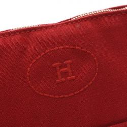 Pre Owned Hermes Red Canvas Trousse De Voyage Bolide Pouch