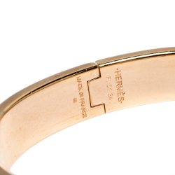 Pre Owned Hermes Clic H Peach Pink Enamel Gold Plated Narrow Bracelet PM