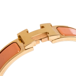 Pre Owned Hermes Clic H Peach Pink Enamel Gold Plated Narrow Bracelet PM