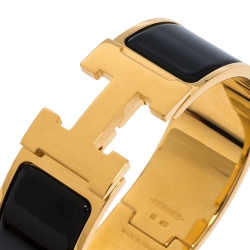 Pre Owned Hermes Clic Clac H Black Enamel Gold Plated Wide Bracelet PM