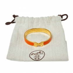 Pre Owned Hermès Clic H Orange Enamel Gold Plated Narrow Bracelet PM