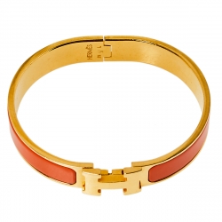 Pre Owned Hermès Clic H Orange Enamel Gold Plated Narrow Bracelet PM
