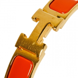 Pre Owned Hermès Clic H Orange Enamel Gold Plated Narrow Bracelet PM