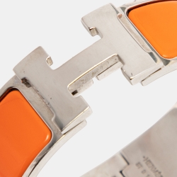 Pre Owned Hermès Clic Clac H Orange Enamel Palladium Plated Wide Bracelet