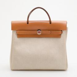 مملوكة مسبقًا Hermes Tan Leather and Beige Toile Canvas Herbag