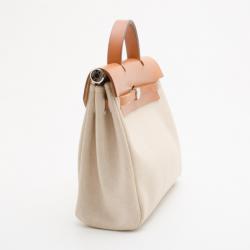 مملوكة مسبقًا Hermes Tan Leather and Beige Toile Canvas Herbag