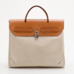 مملوكة مسبقًا Hermes Tan Leather and Beige Toile Canvas Herbag