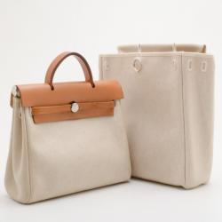مملوكة مسبقًا Hermes Tan Leather and Beige Toile Canvas Herbag