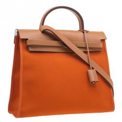 مملوكة مسبقًا Hermes Brown/Orange Canvas and Leather Herbag Zip PM Bag
