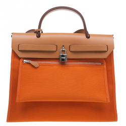مملوكة مسبقًا Hermes Brown/Orange Canvas and Leather Herbag Zip PM Bag