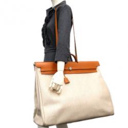Pre Owned Hermes Tan Leather and Beige Toile Canvas Large Herbag