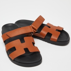 Pre Owned Hermes Tan Leather Chypre Slides Size 38.5