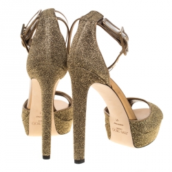 مملوكة مسبقًا Jimmy Choo Metallic Gold Lamè Fabric and PVC Mayner Peep Toe Ankle Cuff Sandals Size 41