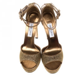 مملوكة مسبقًا Jimmy Choo Metallic Gold Lamè Fabric and PVC Mayner Peep Toe Ankle Cuff Sandals Size 41