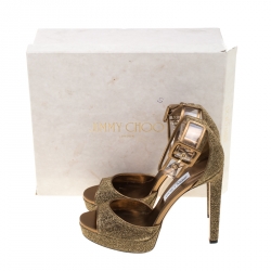 مملوكة مسبقًا Jimmy Choo Metallic Gold Lamè Fabric and PVC Mayner Peep Toe Ankle Cuff Sandals Size 41