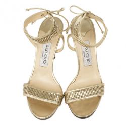 مملوكة مسبقًا صندل بحزام للكاحل جيمي تشو ذهبي مقاس 39