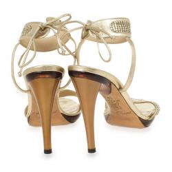 مملوكة مسبقًا صندل بحزام للكاحل جيمي تشو ذهبي مقاس 39