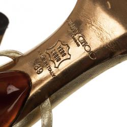 مملوكة مسبقًا صندل بحزام للكاحل جيمي تشو ذهبي مقاس 39